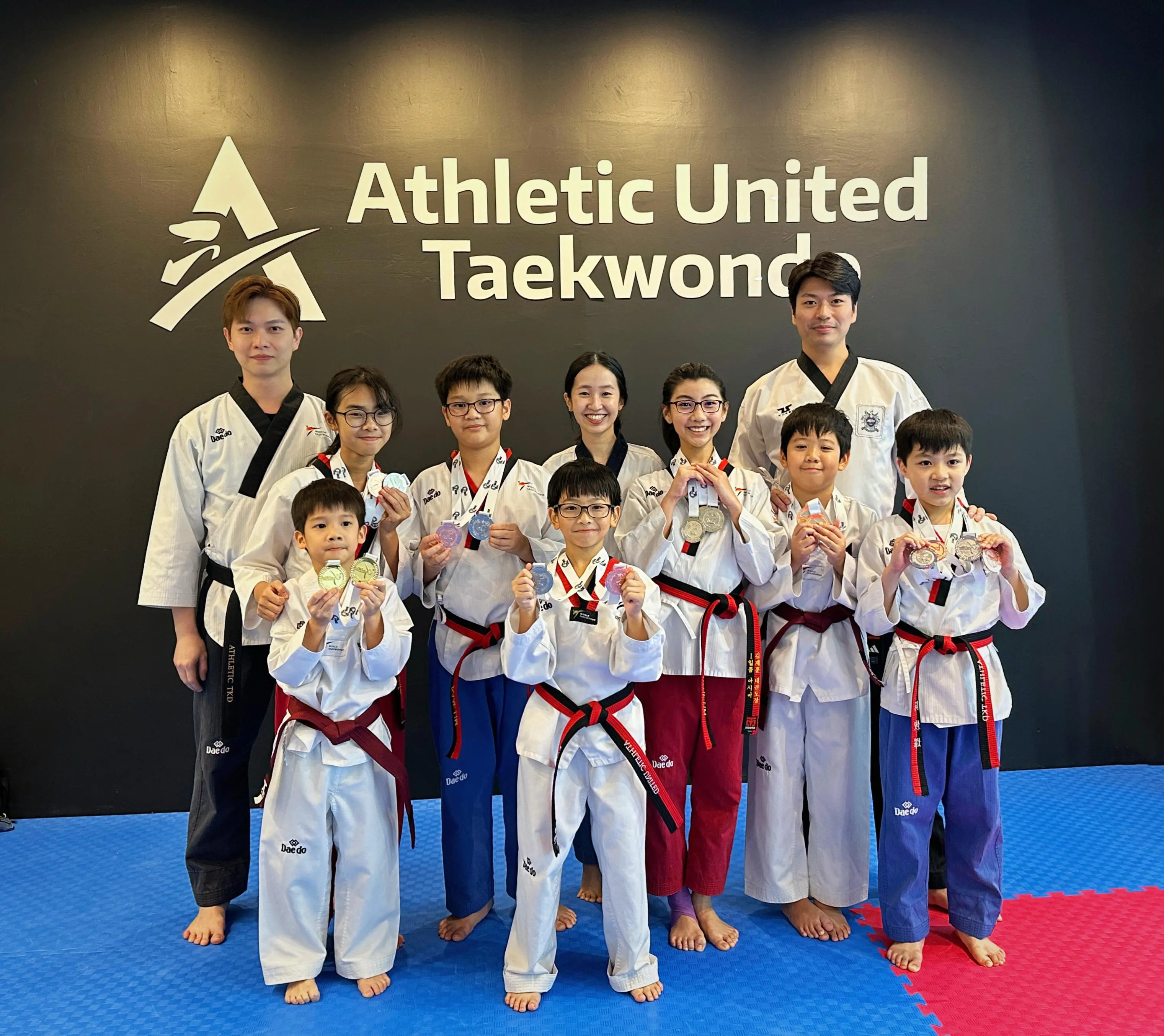 Taekwondo Competition Winners with Instructors